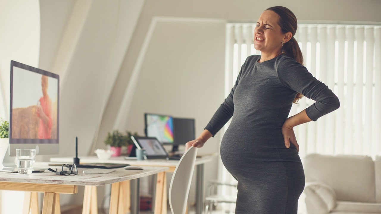 Hamilelikte sırt ağrısı neden olur? Nasıl geçer?